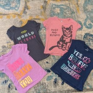 4 Short Sleeve Girls shirts.